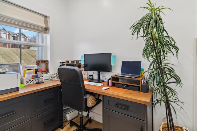 office space with light hardwood / wood-style floors