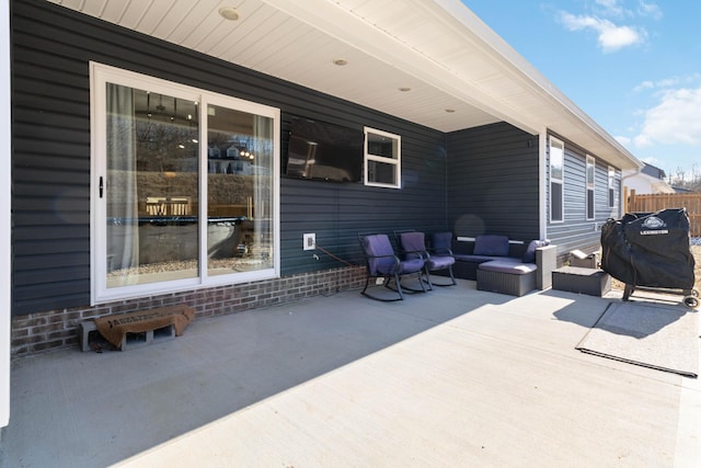 view of patio / terrace with an outdoor living space and grilling area