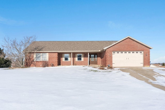 ranch-style home featuring a garage