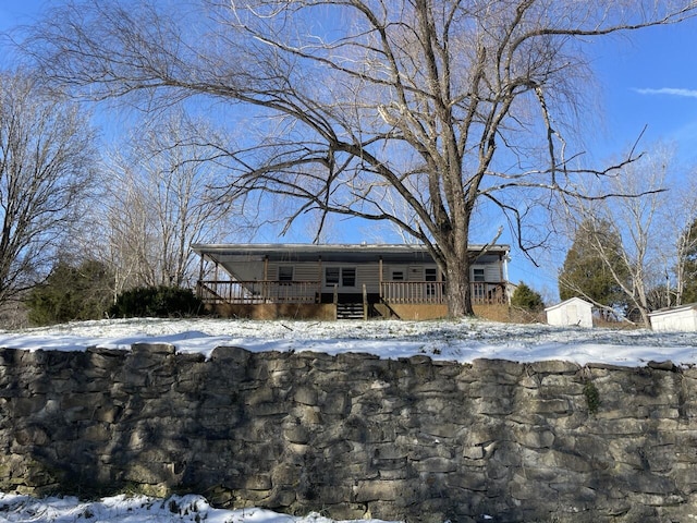 view of front of home featuring a deck