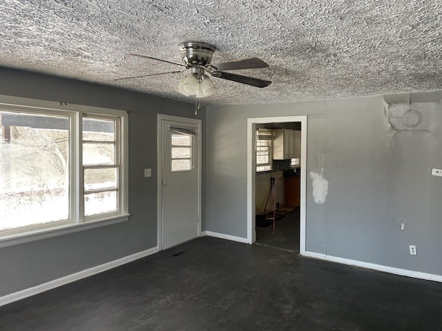 interior space featuring ceiling fan