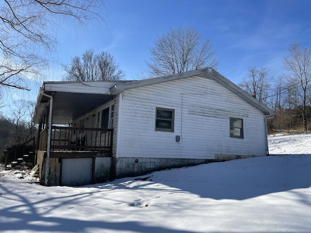 view of snow covered property