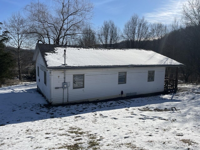 view of snow covered property