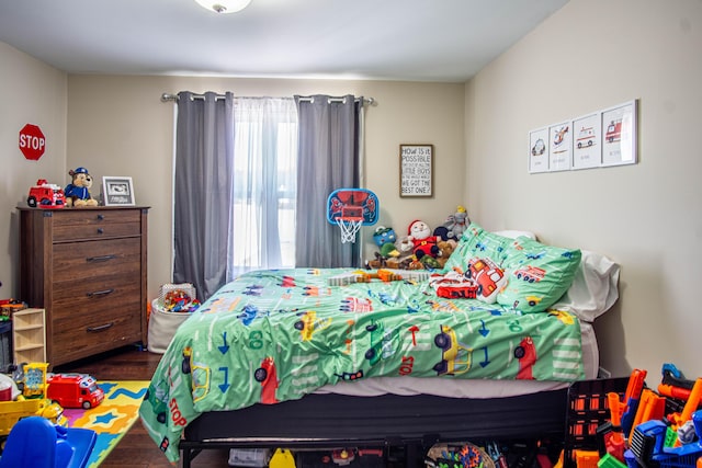 bedroom with wood-type flooring