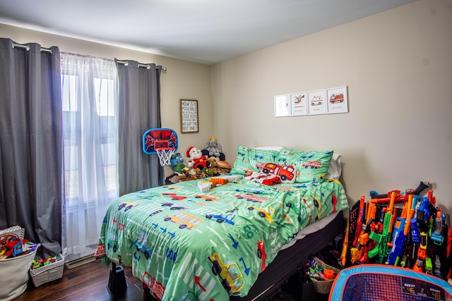 bedroom featuring dark wood-type flooring