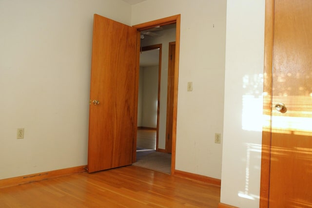 spare room featuring light wood-type flooring