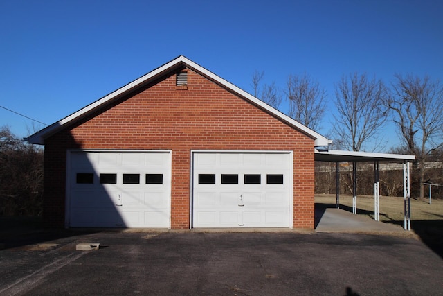 garage with a carport