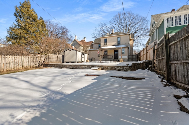 view of snow covered patio