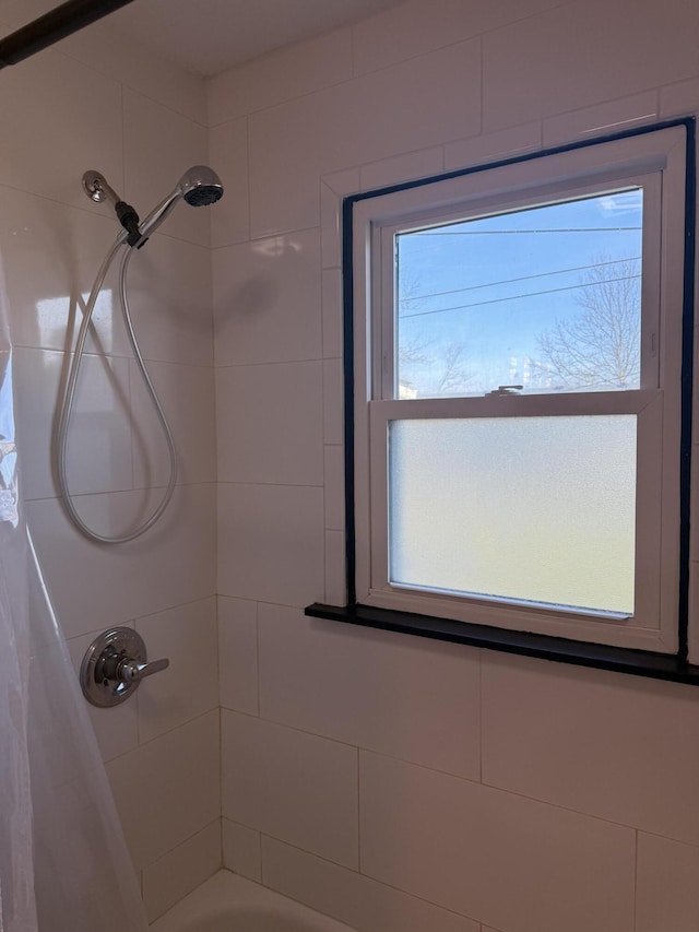 bathroom featuring shower / bath combination with curtain