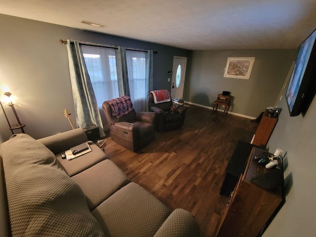 living room featuring dark hardwood / wood-style floors