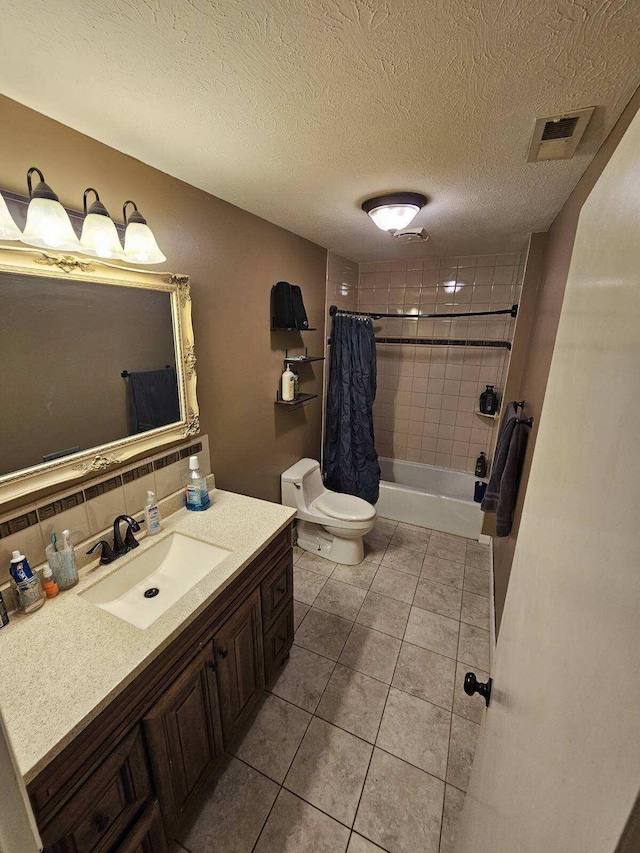 full bathroom with toilet, vanity, tile patterned floors, tasteful backsplash, and shower / bath combo with shower curtain