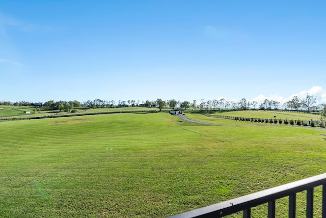 view of property's community with a lawn