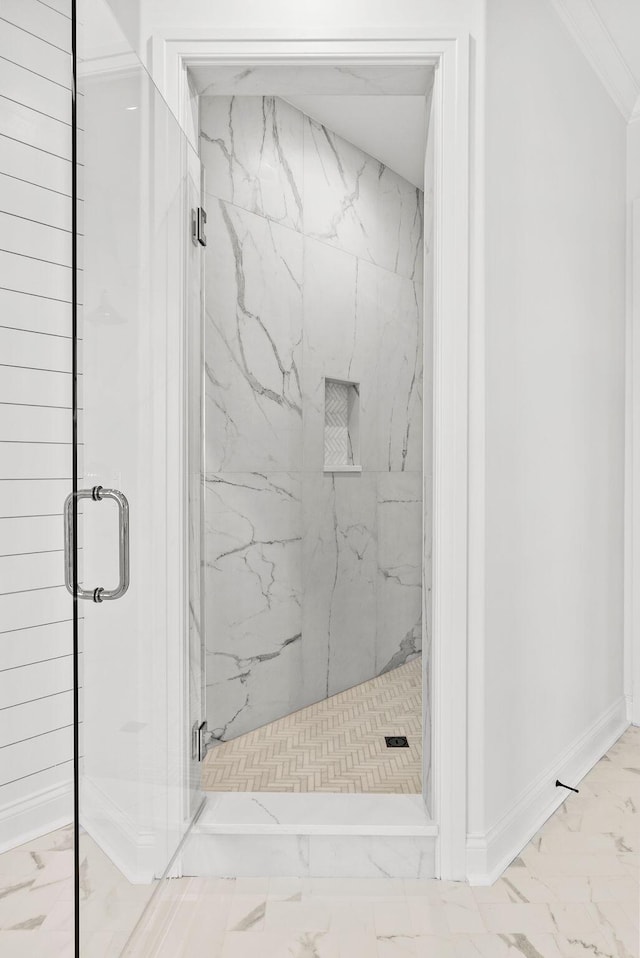 bathroom with a shower with shower door