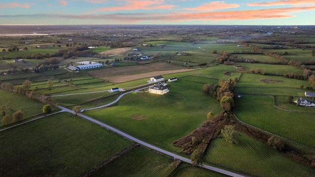 aerial view at dusk with a rural view