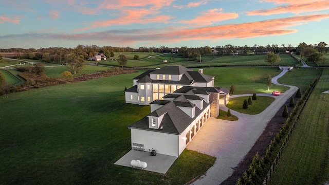 aerial view at dusk with a rural view