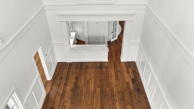 hall featuring dark wood-type flooring