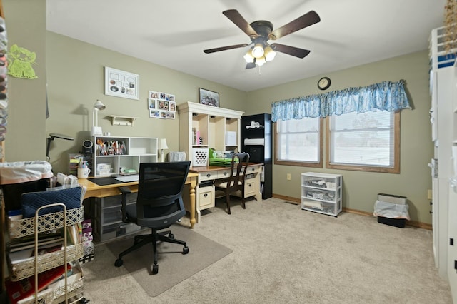 office featuring light colored carpet and ceiling fan