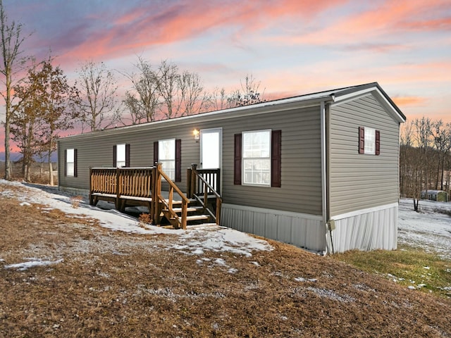 manufactured / mobile home featuring a deck