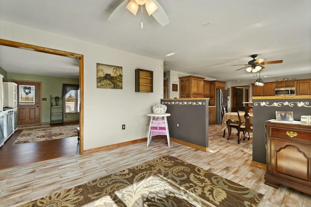 living room with ceiling fan