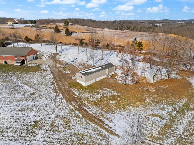 snowy aerial view with a rural view