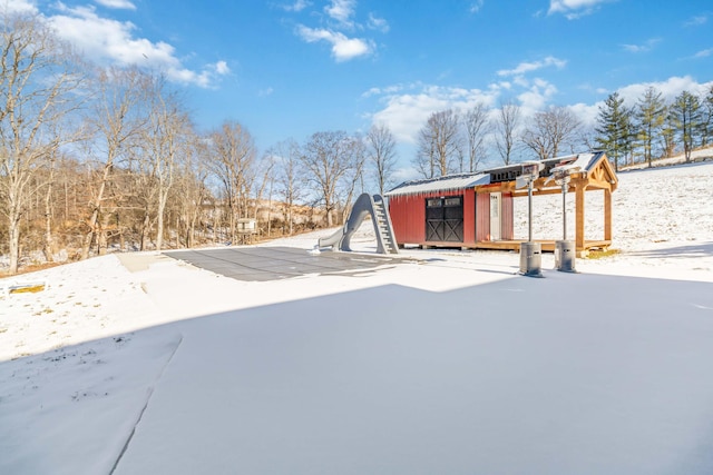 exterior space with a shed