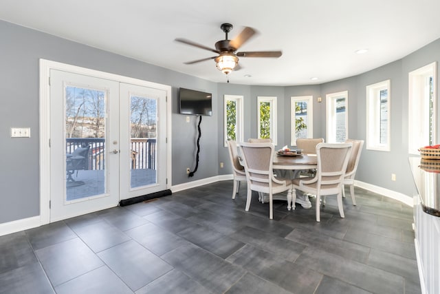 dining space featuring french doors, ceiling fan, and a healthy amount of sunlight