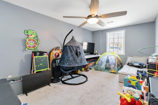 game room featuring carpet floors and ceiling fan