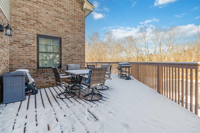 view of snow covered deck