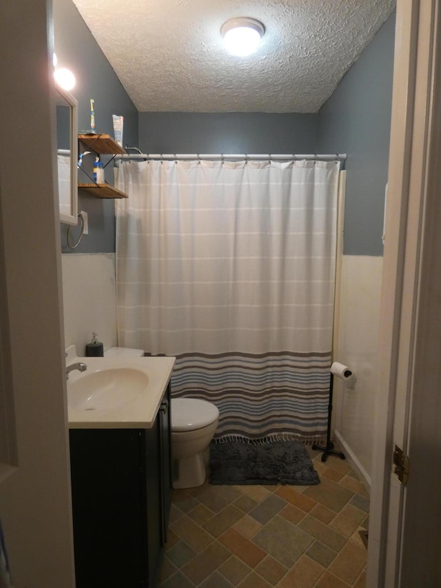 613 Little Hardwicks Creek Rd, Clay City, KY 40312 - bathroom featuring vanity, walk in shower, a textured ceiling, and toilet