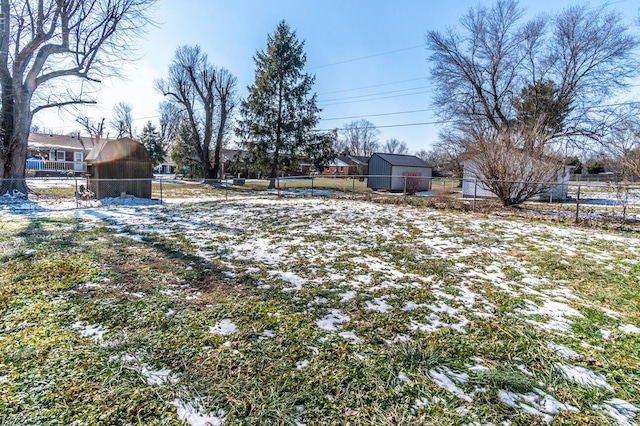 view of yard covered in snow