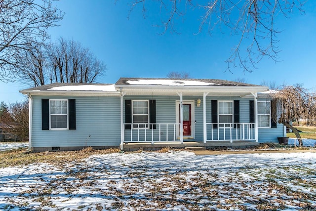 view of front of property featuring covered porch