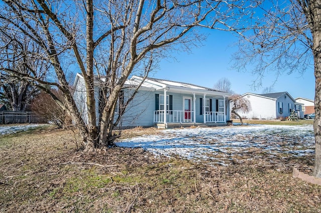 ranch-style home with a porch