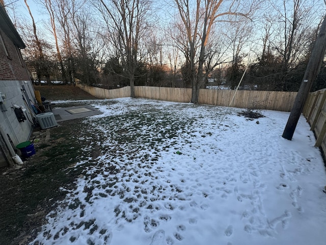 snowy yard with cooling unit