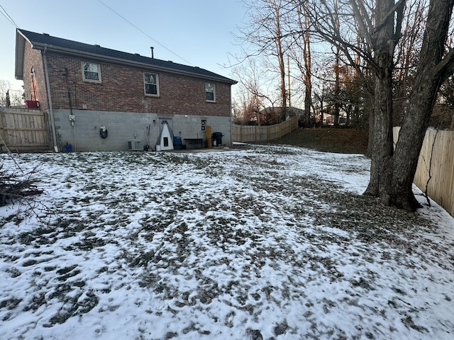 view of snow covered house