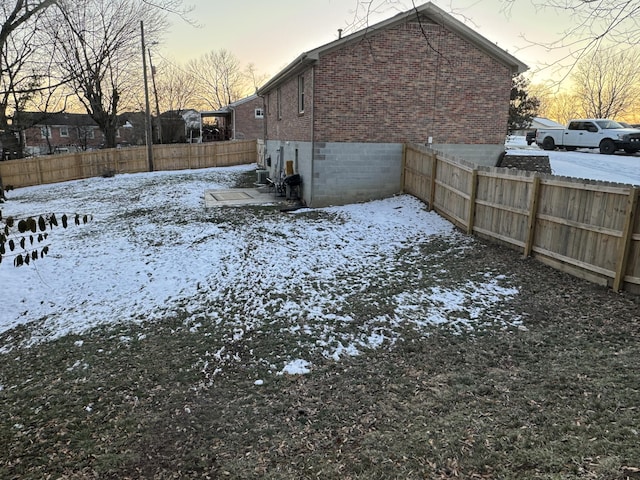 view of yard covered in snow