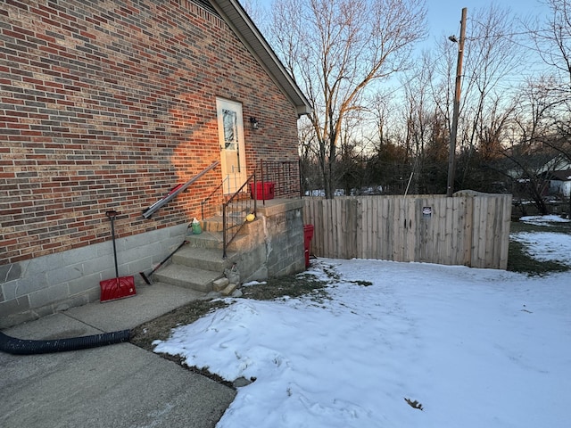 view of yard covered in snow