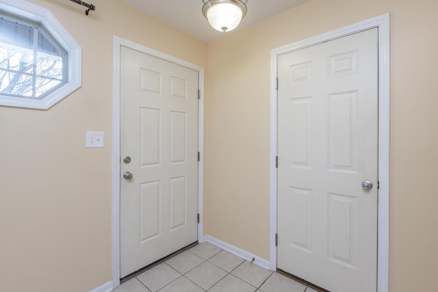 view of tiled foyer entrance