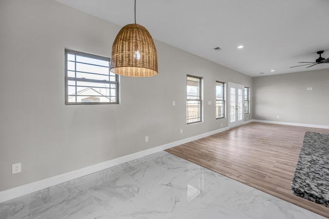 spare room featuring ceiling fan