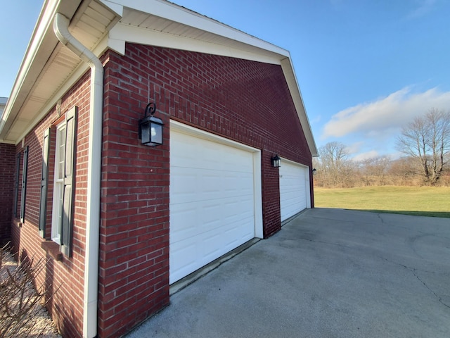 view of side of home featuring a garage and an outdoor structure