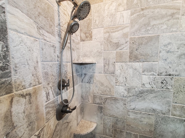 room details with a tile shower