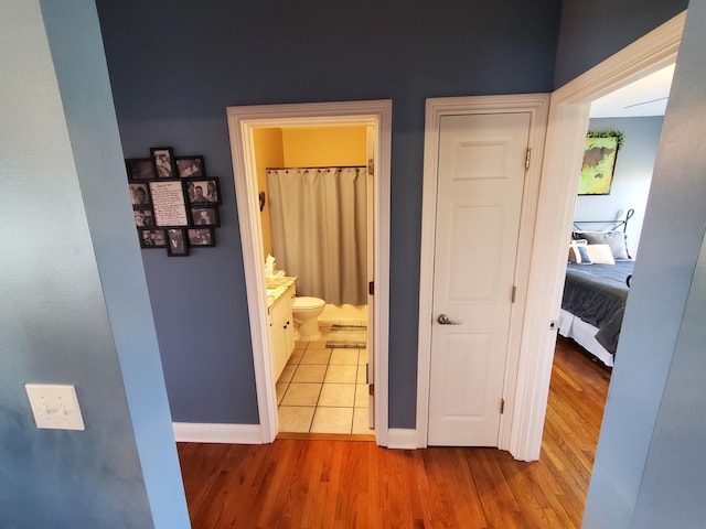 hallway featuring light wood-type flooring