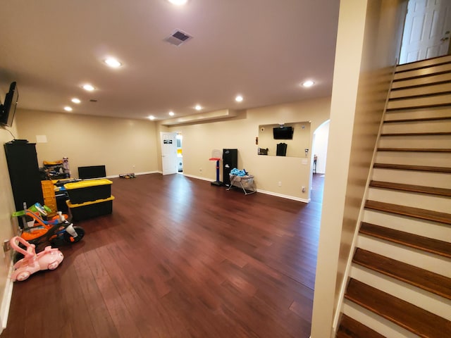 miscellaneous room featuring dark hardwood / wood-style flooring