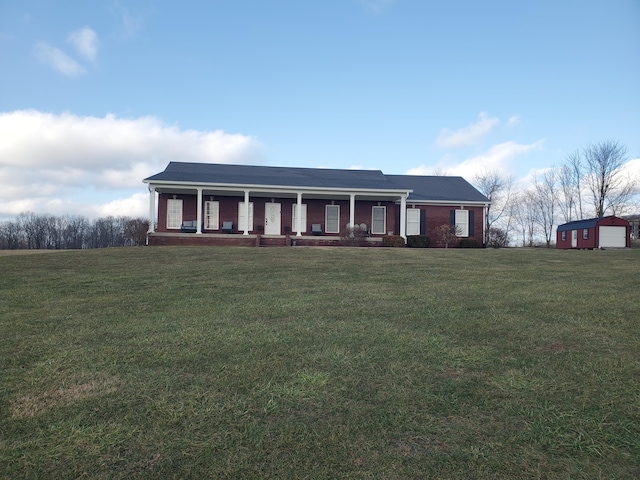 view of front facade with a porch and a front lawn