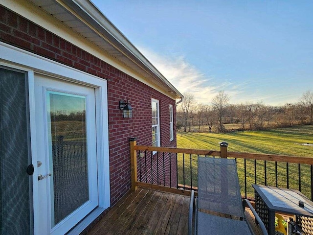 wooden deck with a yard