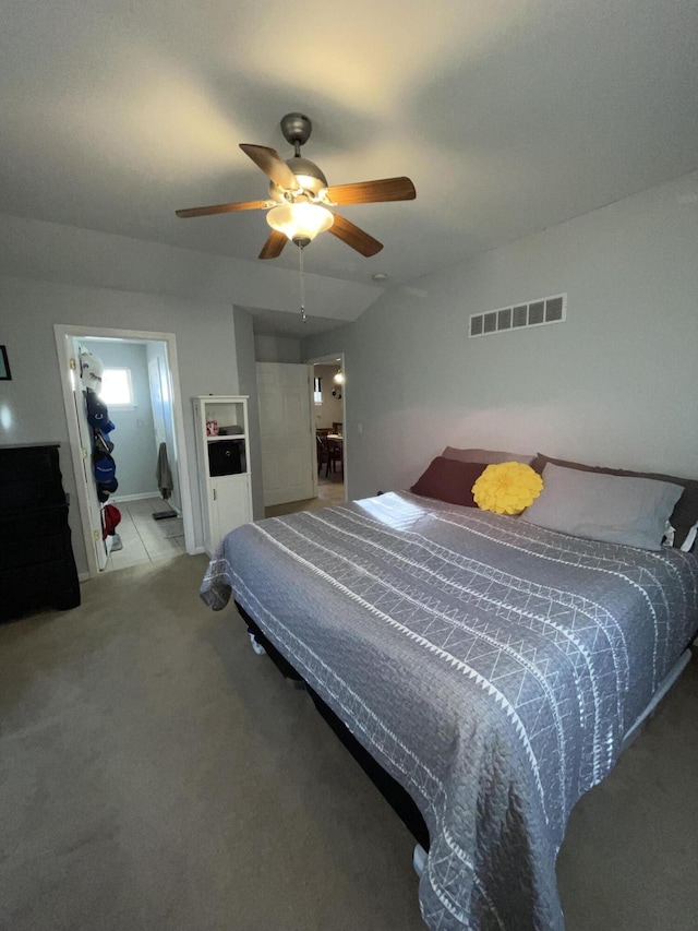 bedroom with visible vents, ceiling fan, and carpet flooring