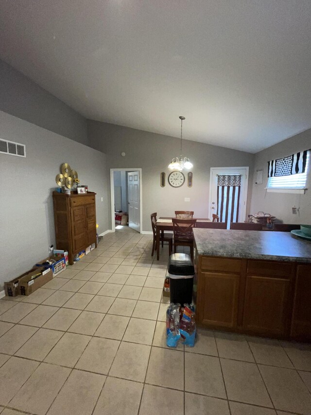 interior space featuring light tile patterned flooring and separate washer and dryer