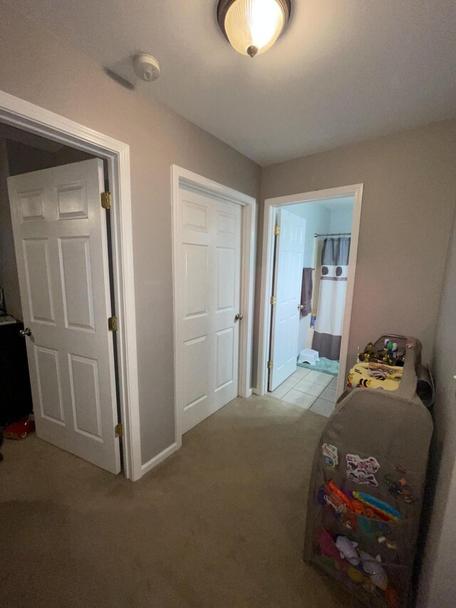 bathroom with tile patterned floors, toilet, and vanity