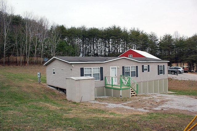 exterior space with a lawn