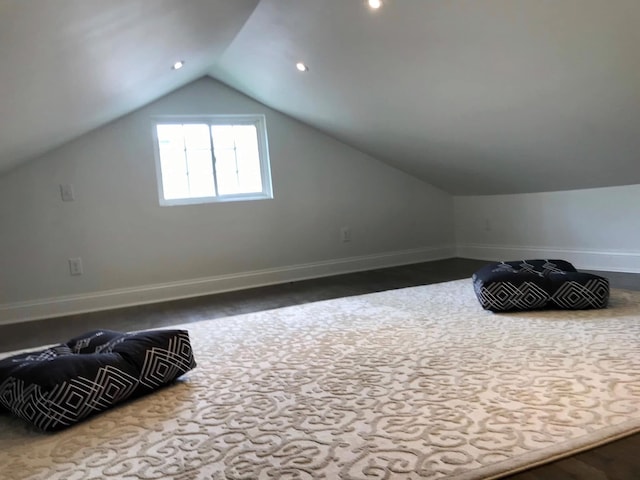 bonus room with lofted ceiling, baseboards, and recessed lighting