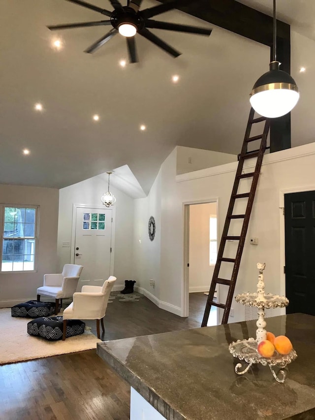 living area featuring stairs, high vaulted ceiling, dark wood-style flooring, and baseboards